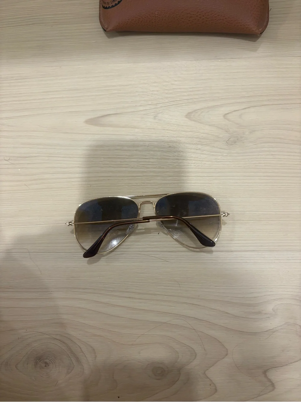 Ray-Ban Women’s Gold Frame Sunglasses with Brown Gradient Lenses